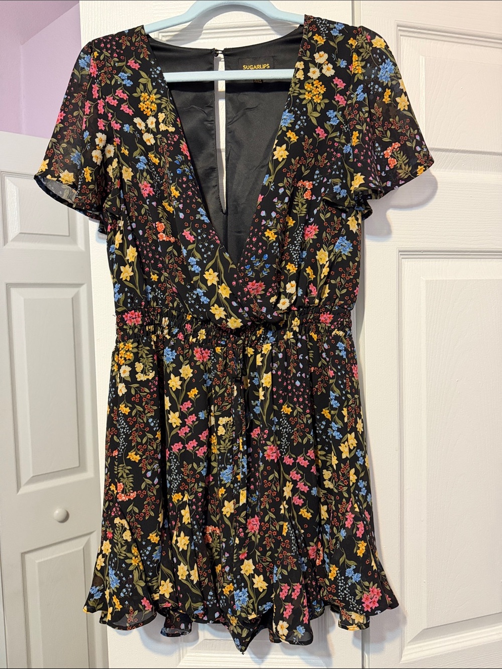 Sugarlips Black Floral V-Neck Short Sleeve Romper with Yellow Pink Blue Accents